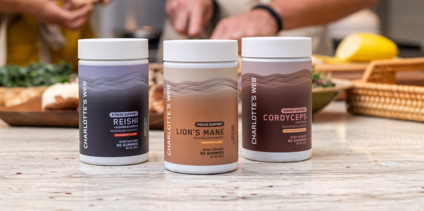 Charlotte’s Web Stress, Focus, and Energy Support Mushroom Gummies displayed on a kitchen counter. These hemp-free gummies feature Reishi, Lion’s Mane, and Cordyceps mushrooms, providing targeted support for stress relief, cognitive function, and energy.